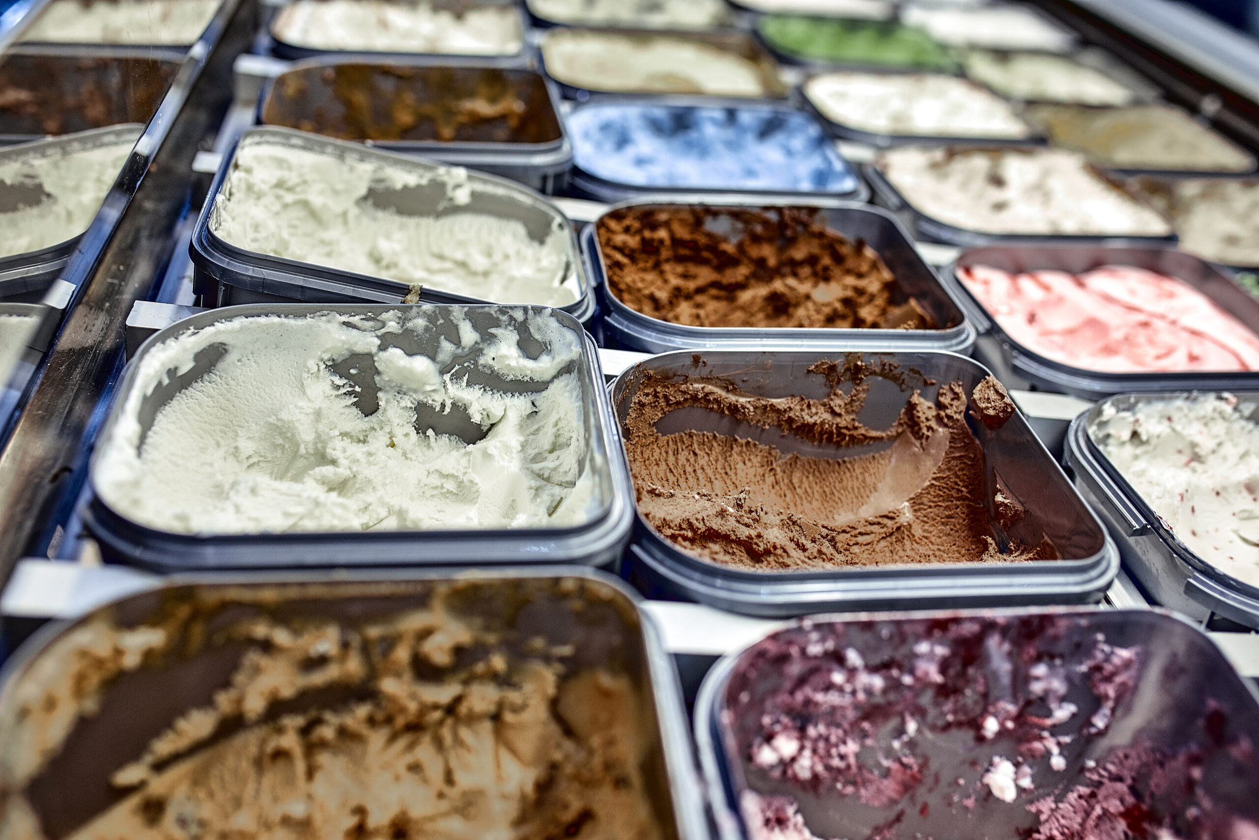 Ice cream showcase with lots of different sorts of ice cream